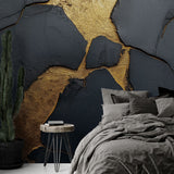 Stunning Black and Gold Marble Wallpaper creating depth in a modern living room with designer furniture