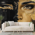 Black and gold abstract portrait mural wallpaper creating a stunning focal point in a modern living room with high ceilings