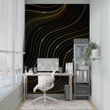 Gold geometric wallpaper making statement in luxury master bedroom