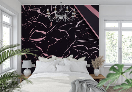 Black and pink marble wallpaper creating drama in a modern living room with minimal furniture