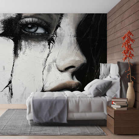 Abstract portrait wallpaper creating dramatic impact in modern living room with minimalist furniture