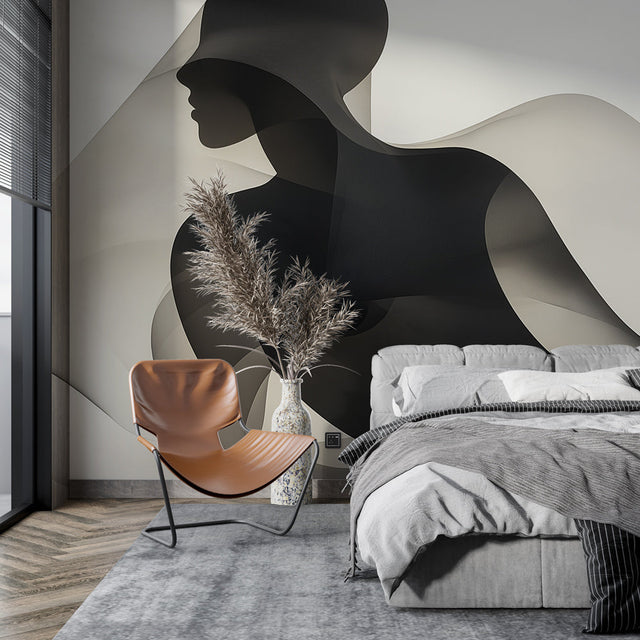 Abstract black and white silhouette wallpaper creating dramatic impact in a modern living room with minimalist furniture