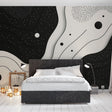Modern abstract wave wallpaper with stars creating a stunning feature wall in a minimalist living room