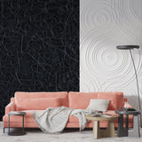 Black textured wallpaper in a sophisticated master bedroom