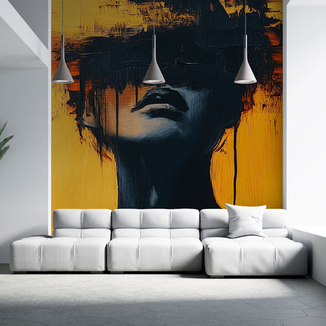 Abstract portrait wallpaper creating dramatic impact in a modern living room with black and gold color scheme