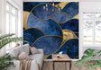 Blue and gold geometric wave wallpaper in modern living room creating luxurious atmosphere