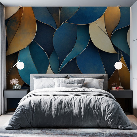 Blue and gold leaf abstract wallpaper creating depth in a modern living room with natural light