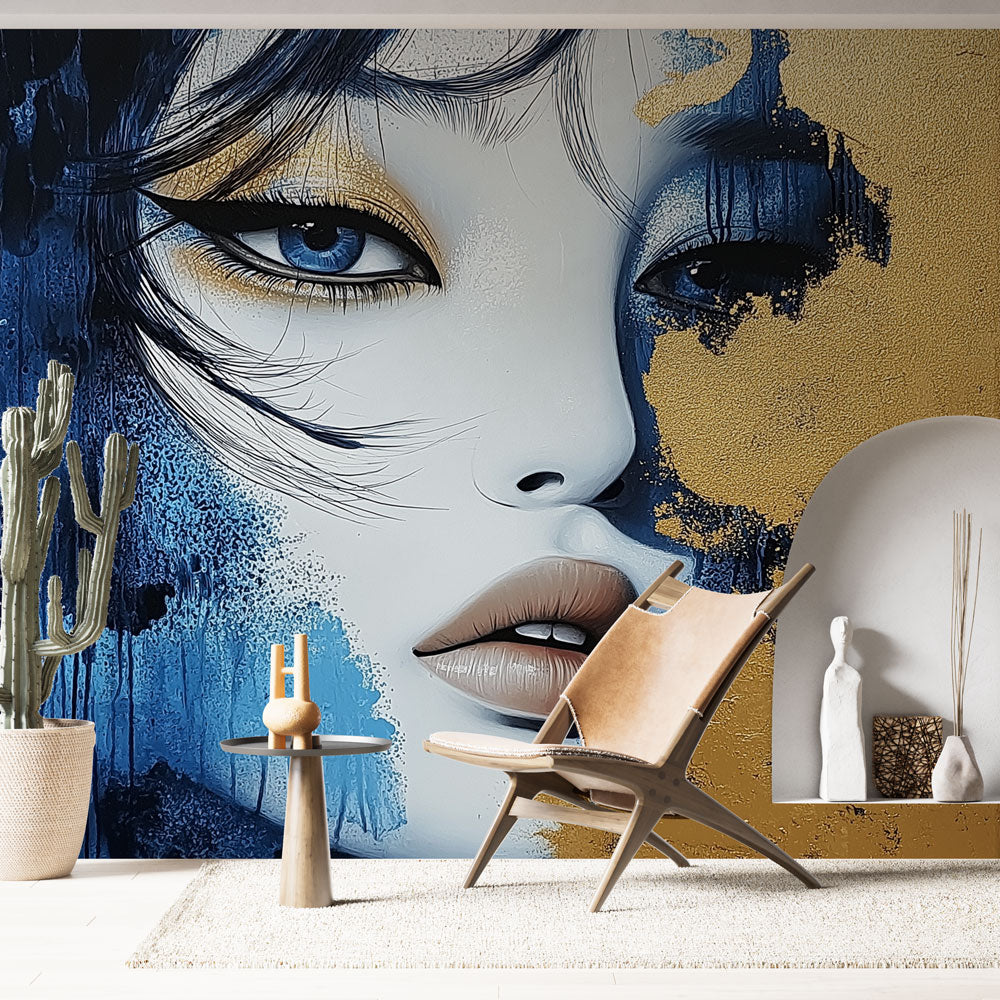 Abstract portrait wall mural with blue and gold tones creating a stunning focal point in a modern living room setting