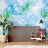 Blue-green abstract wallpaper transforming a dining room with soft, flowing patterns