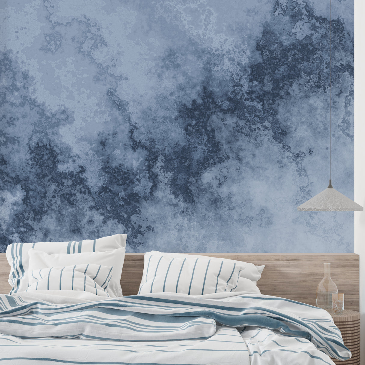 Modern abstract mural with flowing blue and grey tones styled in a dining room
