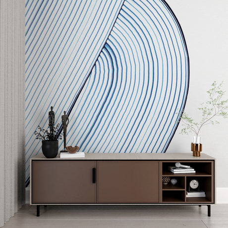 Modern blue wave wallpaper in a minimalist living room creating a serene atmosphere