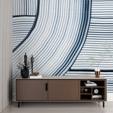Abstract blue line wallpaper creating depth in a minimalist home office setting
