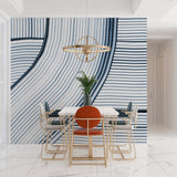 Geometric blue wave wallpaper in a contemporary dining room with pendant lighting