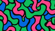 Modern abstract wallpaper with pink, green and blue geometric pattern styled in a bright contemporary living room setting