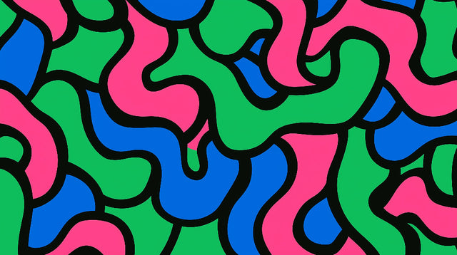 Modern abstract wallpaper with pink, green and blue geometric pattern styled in a bright contemporary living room setting