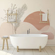 Abstract botanical wallpaper with terracotta shapes creating a calm atmosphere in a modern living room setting