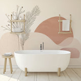 Abstract botanical wallpaper with terracotta shapes creating a calm atmosphere in a modern living room setting