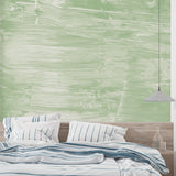 Green abstract mural in modern entrance hall with minimal styling