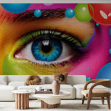 Modern abstract eye wallpaper creating a bold statement in a minimalist living room with white furniture