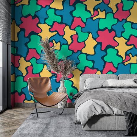 Abstract puzzle wallpaper bringing bold colors to a modern living room with minimal furniture