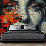 Abstract portrait wallpaper with red geometric patterns creating drama in a modern living room setting