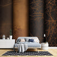 Black and gold leather pattern wallpaper creating a bold statement wall in a modern living room with leather furniture