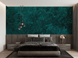 Deep emerald marble effect wallpaper in master bedroom with white furniture