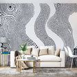 Modern living room featuring Abstract Dot Wave Wallpaper in black and white, creating a stunning accent wall behind a minimalist sofa