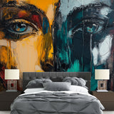 Abstract portrait wallpaper creating dramatic impact in modern living room with turquoise and gold tones