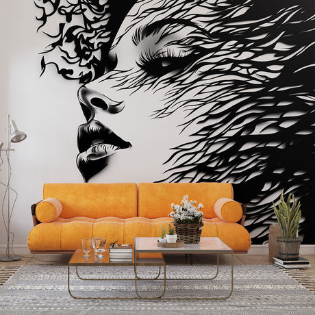 Black and white abstract portrait mural wallpaper creating dramatic impact in modern living room setting