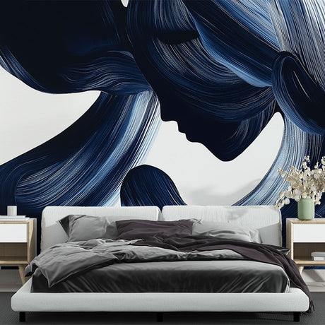 Abstract blue brushstroke wallpaper creating dramatic impact in a modern minimalist living room with white furniture