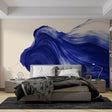 Blue wave abstract wallpaper creating a stunning accent wall in a modern living room with white furniture