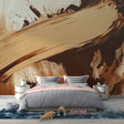 Abstract brushstroke wallpaper in beige and brown tones creating a dramatic focal point in a modern living room setting