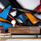 Modern Abstract Geometric Wallpaper showcasing bold blue and orange lines in a stylish contemporary living room setting