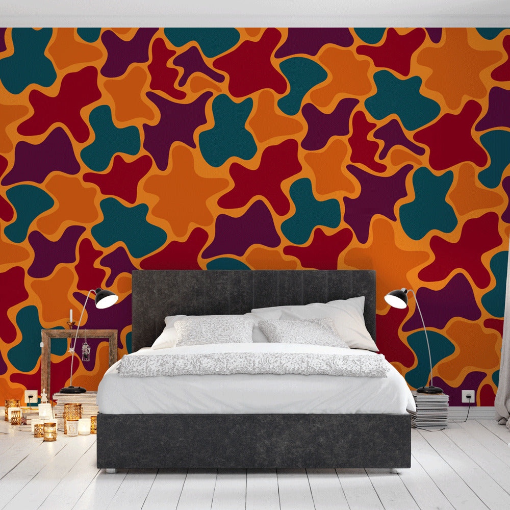 Abstract pattern wallpaper creating a bold statement wall in a modern living room with natural light and minimal furniture
