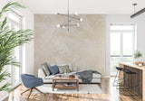 Abstract gold pattern wallpaper in hallway creating depth and movement