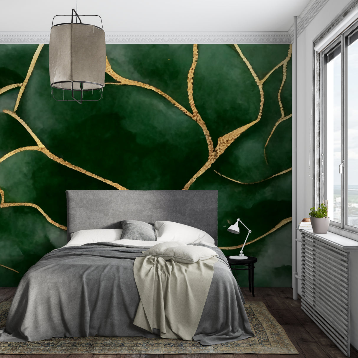 Emerald green wallpaper with gold veins brightening up a cozy bedroom space