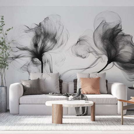 Modern living room with abstract black smoke floral wallpaper creating a peaceful atmosphere against white furniture