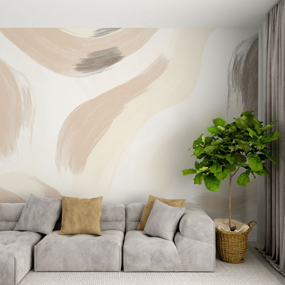 Abstract brush stroke wallpaper in beige and grey tones creating a calm atmosphere in a modern living room setting