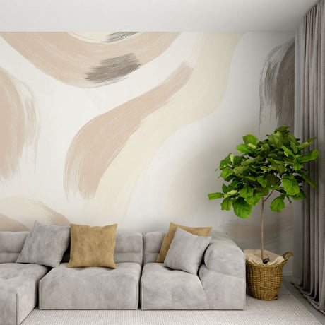Abstract brush stroke wallpaper in beige and grey tones creating a calm atmosphere in a modern living room setting