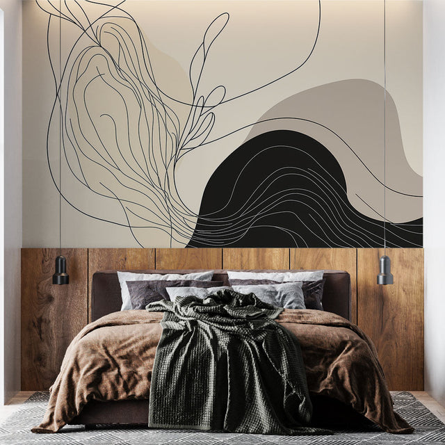 Abstract line art wallpaper creating a modern focal point in a minimal living room with black and beige flowing patterns