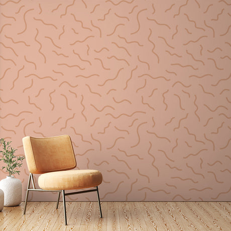 Abstract line wallpaper with terracotta flowing pattern shown in a modern minimalist living room setting
