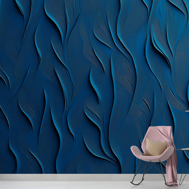 Blue wave pattern wallpaper creating depth in modern living room with grey sofa and natural lighting