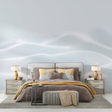 White wave wallpaper creating depth in modern living room, soft curves catching natural light