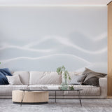 Abstract wave mural in minimalist bedroom showing flowing pattern movement