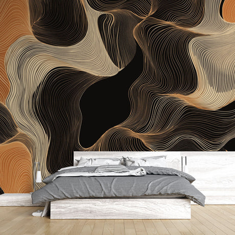 Modern abstract black and gold wallpaper mural creating dramatic impact in a minimalist living room setting