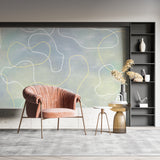 Modern abstract wallpaper installation in a contemporary hallway setting