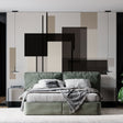 Modern geometric black and beige wallpaper mural in a minimalist living room with natural light and contemporary furniture