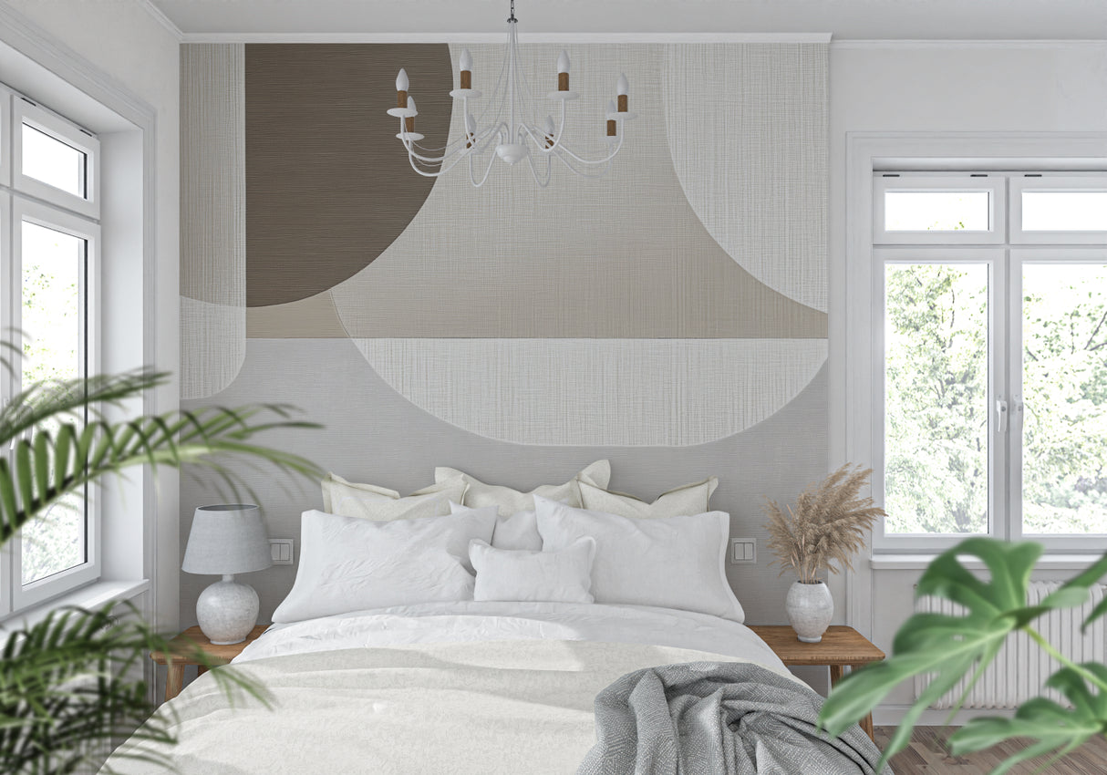 Elegant entryway showcasing curved geometric wallpaper pattern in soft greys and beige