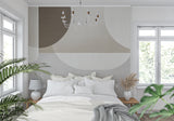 Elegant entryway showcasing curved geometric wallpaper pattern in soft greys and beige